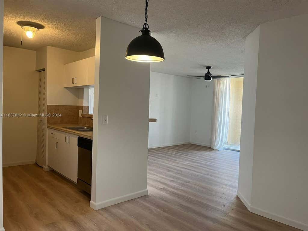 Photo of 1715 Village Blvd #203, West Palm Beach, FL 33409 (MLS # A11637652)