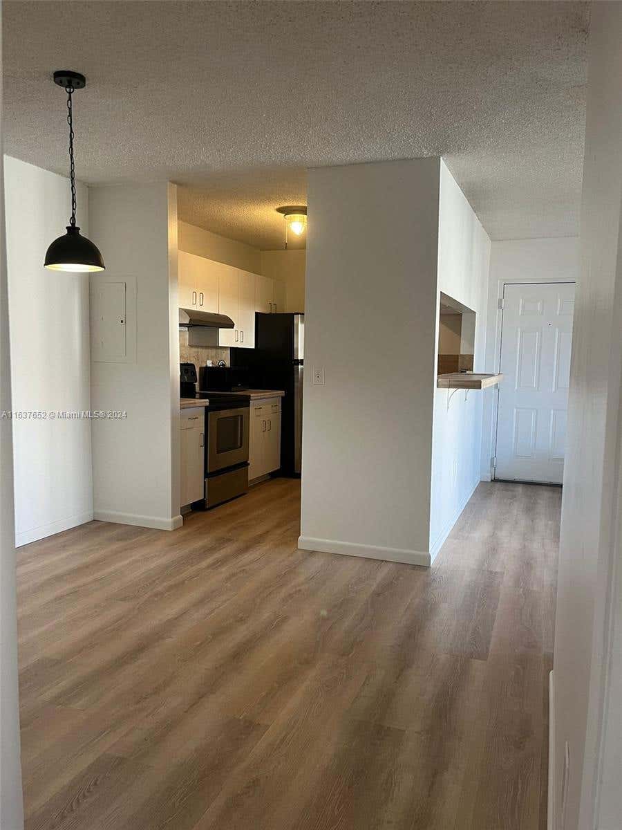 Photo of 1715 Village Blvd #203, West Palm Beach, FL 33409 (MLS # A11637652)