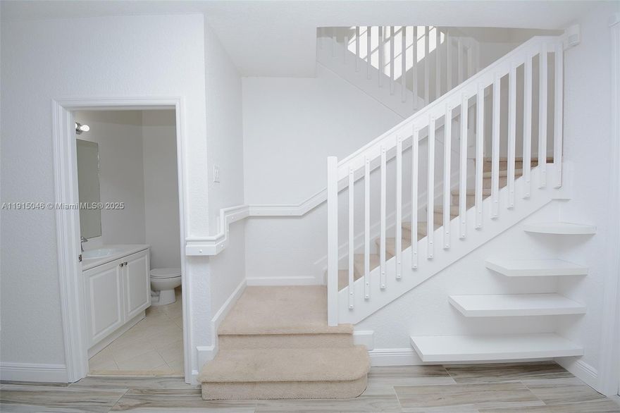 Impeccable and nicely renovated large 3 bedroom and 2.5 bath townhome in the gated community of Isles of Bayshore. Property includes Stainless Steel appliances, new large Samsung washer/dryer, large backyard patio and storage unit. Lots of natural lighting through out the house. High end tiles on the first floor. The community offers state of the art amenities for family and kids: pool, club house, gym, game room and a beautiful lake to sit down and relax. You can park and walk to the lake, it is next to the house. Very beautiful and relaxing. Easy to show. If you are looking for a well taken property to call home, this is it. Lots of parking available. Black Point marina just 3 minutes away and turnpike for easy commute.