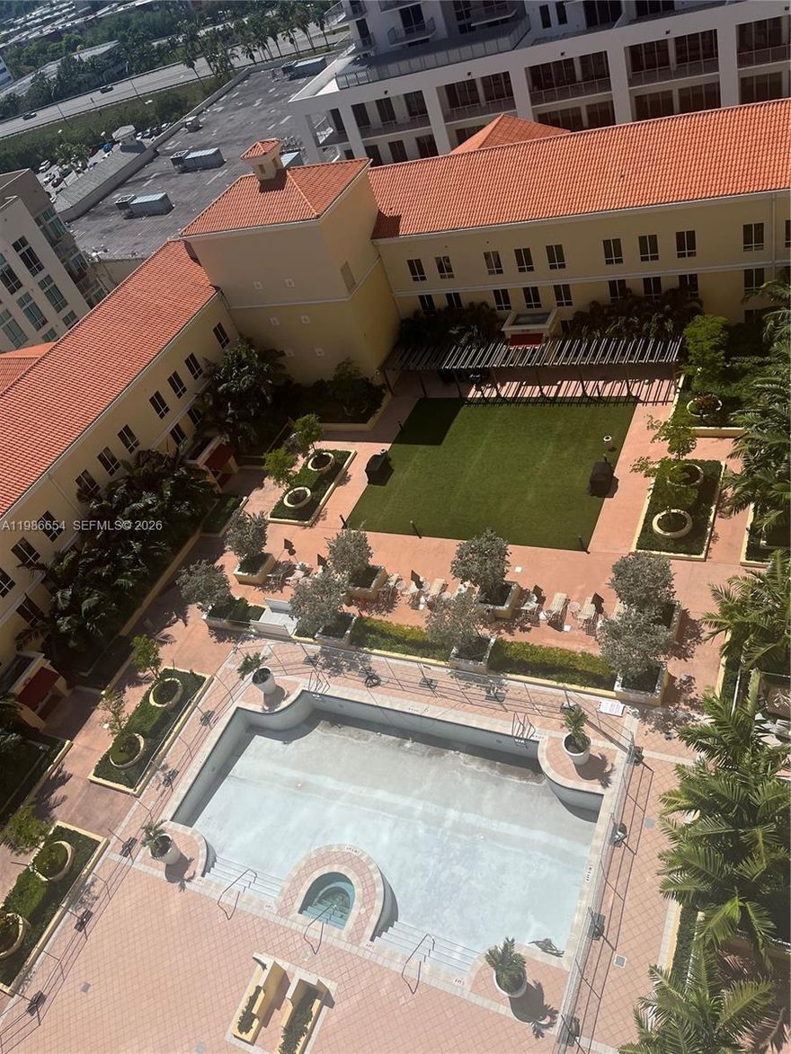 Toscano Condominium is one of the premier residences located in downtown Dadeland, the community offers gated parking, valet guest parking, and a full-time concierge. Residents enjoy a modern gym, 24/7 security, and a newly renovated building. The outdoor pool area is truly magnificent. This unit features a giant private patio and comes with two parking spaces in an enclosed, private garage. Just a short walk to Dadeland Mall, Publix, and many fine restaurants—convenience and luxury at its best.