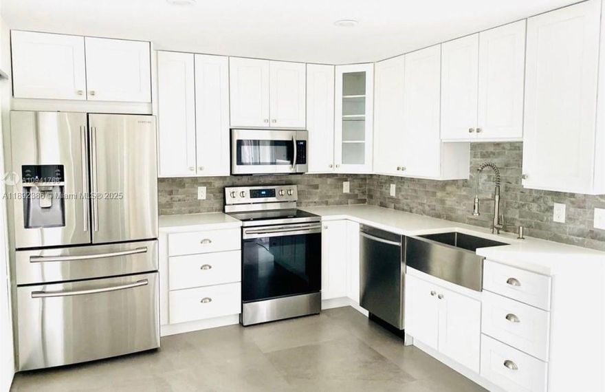 You've found the one! This stunning lakefront 3 bed, 3 bath two-story townhome features a modern upgraded kitchen, large tile floors, new appliances, updated bathrooms, and plenty of storage. Enjoy peaceful sunrises from your back patio overlooking the lake. Includes 2 parking spots plus guest parking right out front. This community of Flamingo Villas boasts 24hr security, 2 pools, Tennis Courts and a Gym w/Sauna Room. Conveniently located within walking distance to Memorial Hospital West, CB Smith Park, and Pembroke Lakes Mall. Welcome home!