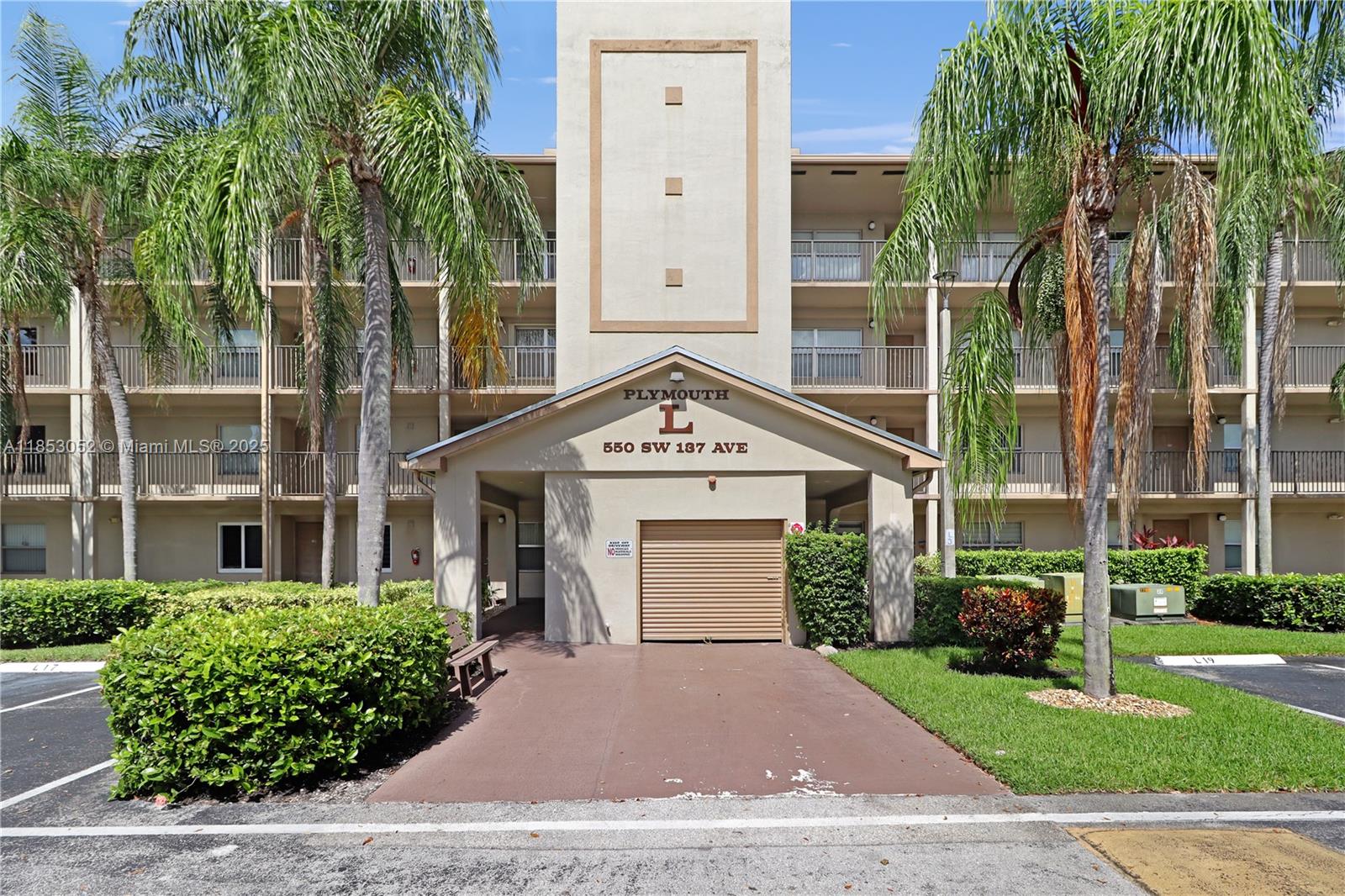 Step into this spacious first-floor unit in the highly sought-after Century Village Plymouth section. This home features a functional split-bedroom floorplan, a refreshed kitchen, updated bathrooms, and the convenience of an in-unit washer and dryer. Assigned parking is just steps from your door. Enjoy resort-style living in this 55+ gated community, offering 24-hour security, a golf course, a clubhouse with a theater, multiple pools, fitness centers, tennis and pickleball courts, and the Club Health wellness center with its unique heated wave-walking pool. Courtesy transportation and social activities are also available. Plus, you'll love the convenience of being located in the heart of Pembroke Pines, near shopping, dining, and medical centers.