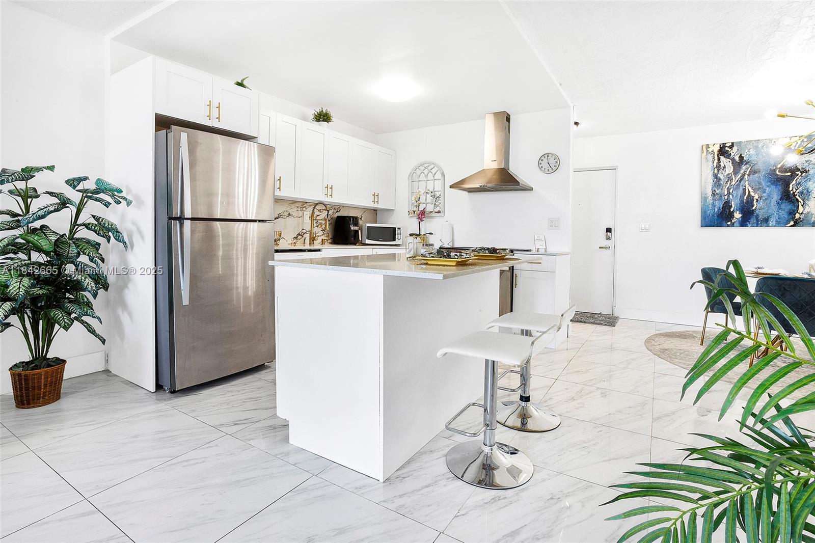 Exceptional opportunity to own a condo that blends style, comfort, and investment potential! This sophisticated 1-bedroom, 1.5-bath unit is located in Omega IV - the only building in the complex that allows immediate rentals with no restrictions. Thoughtfully renovated with designer finishes and elegant touches throughout, this home features a leek open kitchen with marble countertops, high-quality appliances, and a spacious layout. The private balcony on the 4th floor overlooks the lush green area and parking. Assigned parking plus ample guest spaces. The community offers a pool, jacuzzi, gym, billiard room, clubhouse, and 2 laundry rooms per floor. Pet-friendly. Prime location. Whether you're seeking a refined residence or a high-return rental, this one stands out from the rest!