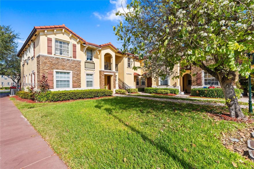 Welcome to your turn-key home at Villas at Carmel!!  Features quality renovations, new kitchen appliances and recently renovated patio with pavers throughout .  Tile throughout the home, blinds, fenced patio,  accordion shutters on second floor with panel shutters on first floor.  Lots of natural light peers through the windows during the day, making for beautiful illumination inside with principal room with view to a lagoon and garden.  HOA includes a fantastic clubhouse with excellent gym, large pool, jacuzzi ,which currently are being renovated.  It also offers a large space for owners to rent out for parties and events.  Security patrol continuously guards the property.  Ample parking in front of unit allows for seamless hosting.  Next to Baptist Hospital, access to Florida Turnpike , Krome Avenue and near the Keys.  Dont miss the opportunity!!