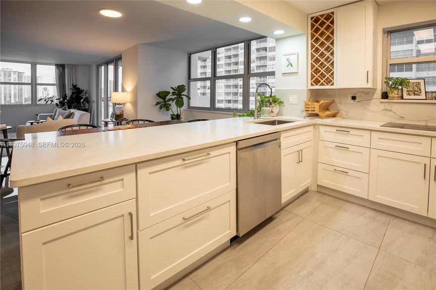 FULLY RENOVATED! This is modern living in the heart of Aventura at its best! Stunning water views from EVERY ROOM! This gorgeous corner unit offers the best of all worlds - a spacious open floor plan on the 8th floor with abundant natural light, a spacious and comfortable floorplan, and top notch renovations. Walking distance to Fresh Market, Publix, local dining, Williams Island, and Aventura schools, minutes to Aventura Mall, Gulfstream and Costco, close to both FLL and MIA. Condominium offers two in-ground pools, tennis courts, car-washing station, guest parking, and a newly renovated gym with brand new equipment! Don't miss the chance to live in this waterfront gem; a rarely-seen, high-quality upgraded unit. Impact windows and doors, fully updated kitchen including stainless steel sink and appliances, updated kitchen cabinets offer ample storage space, expansive porcelain countertops, DOUBLE WALL-OVEN, fridge-door water supply, spacious entry hall, generous closet space (walk-in and shelved linen closet), large 4x2 tile flooring throughout including tile baseboards, bathtub and shower, spacious balcony.