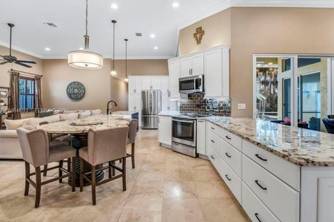 Photo of 1306 Crossbill Ct, Weston, FL 33327 (MLS # A11964693)