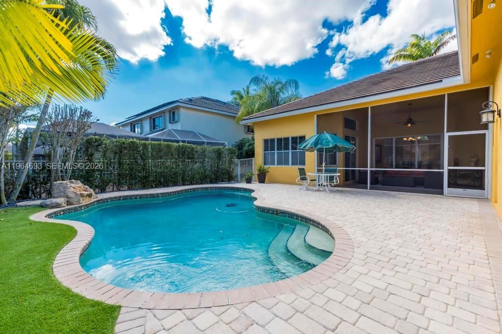 Photo of 1306 Crossbill Ct, Weston, FL 33327 (MLS # A11964693)