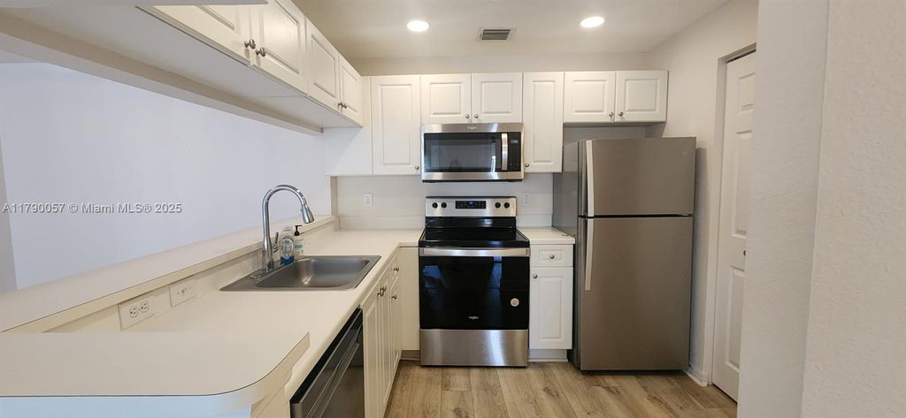 Photo of 2804 Sarento Pl #204, Palm Beach Gardens, FL 33410 (MLS # A11790057)