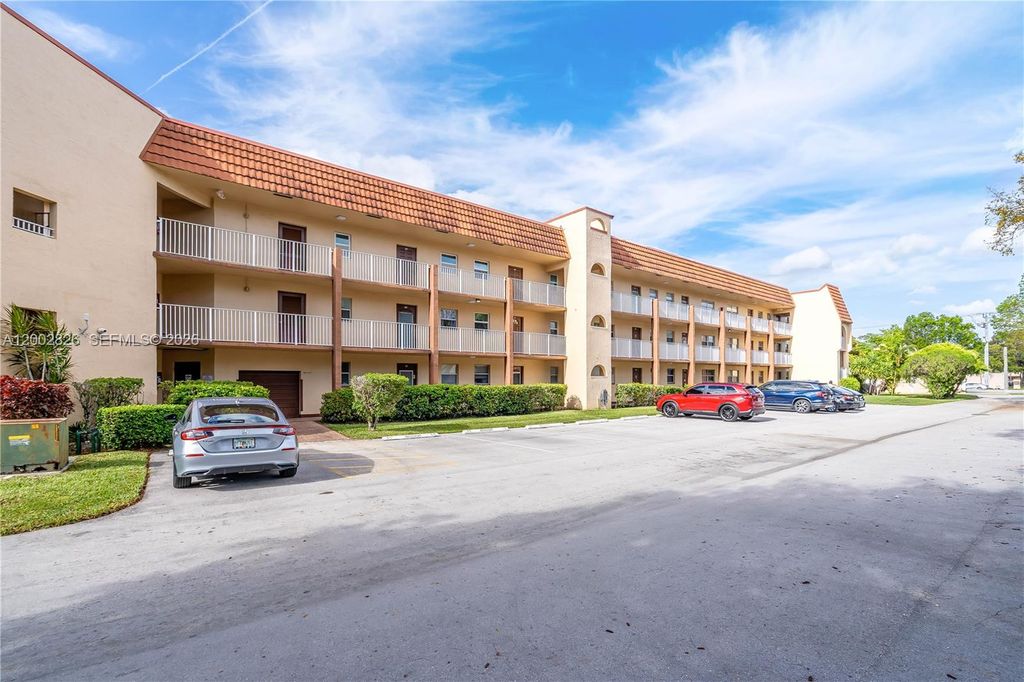 Photo of 2811 N Pine Island Rd #108, Sunrise, FL 33322 (MLS # A12002826)