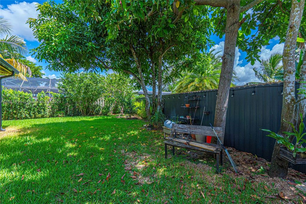 Photo of 1401 NW 115th Ave, Pembroke Pines, FL 33026 (MLS # A11627416)