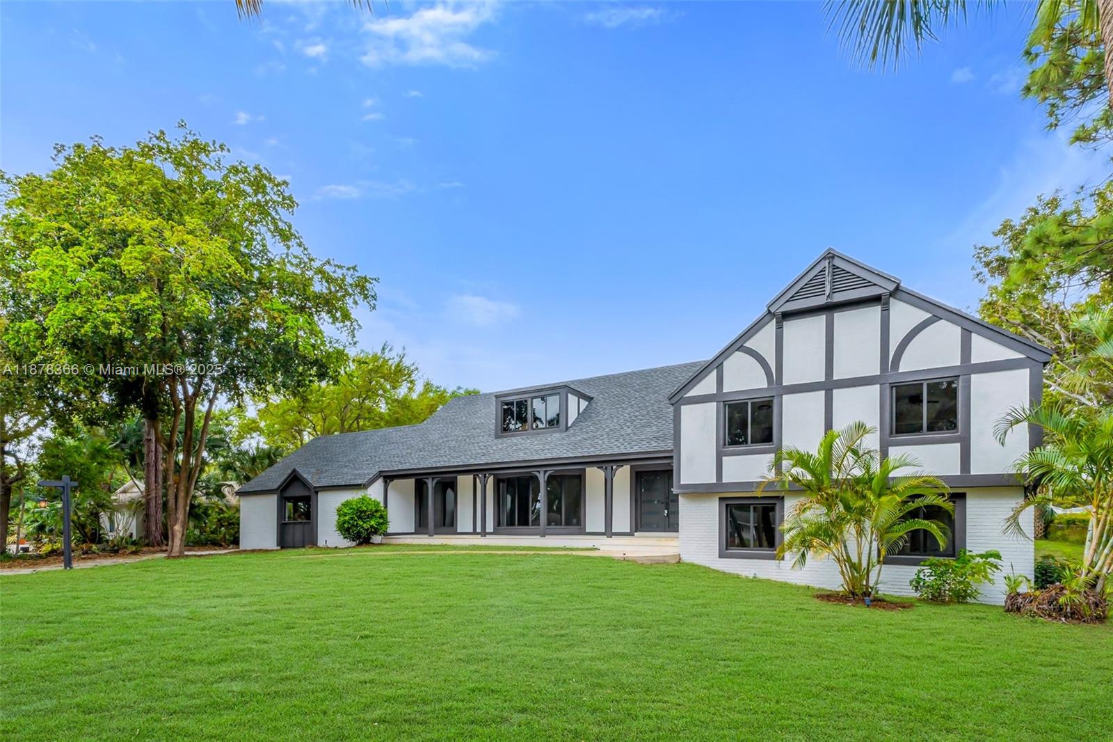 With a spacious 5141 sq ft living area, this home is perfect for those seeking luxury and comfort. This stunning Palm Beach Gardens home boasts 2 extra rooms, an electric vehicle charger, and a central vacuum system. It offers an ample car garage, all impact windows and doors, and your own private pool. The kitchen features granite counters and top-of-the-line stainless steel appliances. This home has been completely remodeled, with a new roof, and fresh paint throughout. Situated on a 42188 SF lot, there is plenty of room for enjoying the beautiful Florida weather. The guest house offers additional living space for visitors, for an office, or a gym. Located minutes from the beach and The Gardens Mall, you'll have easy access to shopping and entertainment options.