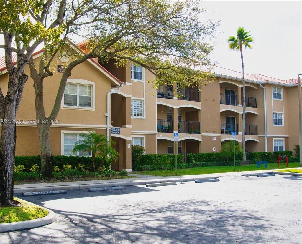 Photo of 215 SW 117th Ter #14107, Pembroke Pines, FL 33025 (MLS # A12021750)