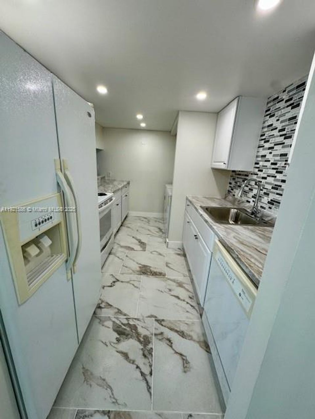 Photo of 2081 NW 46th Ave #H102, Lauderhill, FL 33313 (MLS # A11921586)