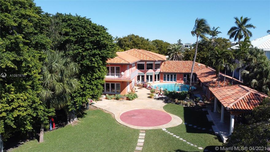 Rare opportunity to own one of the last waterfront estates on Hurricane Harbor, boasting one of the largest docks, a Boater's Dream.  The special concrete dock can accommodate up to 80 ft Yacht, and two additional boats.  Indulge in one of Key Biscayne's largest lots, with 21,483 SF.  This 5 Bed 5.5 Bath, 2 story estate was completely updated  in 1992, and has an ultimate open space floor plan with an abundance of natural light and double height ceilings through out living area.  There's a poolside Cabana House with full bath, and a covered entertainment area in the over-sized backyard.  Marble floors throughout, and a two car A/C garage, plus additional covered parking. 24 Hour Notice for Showings.