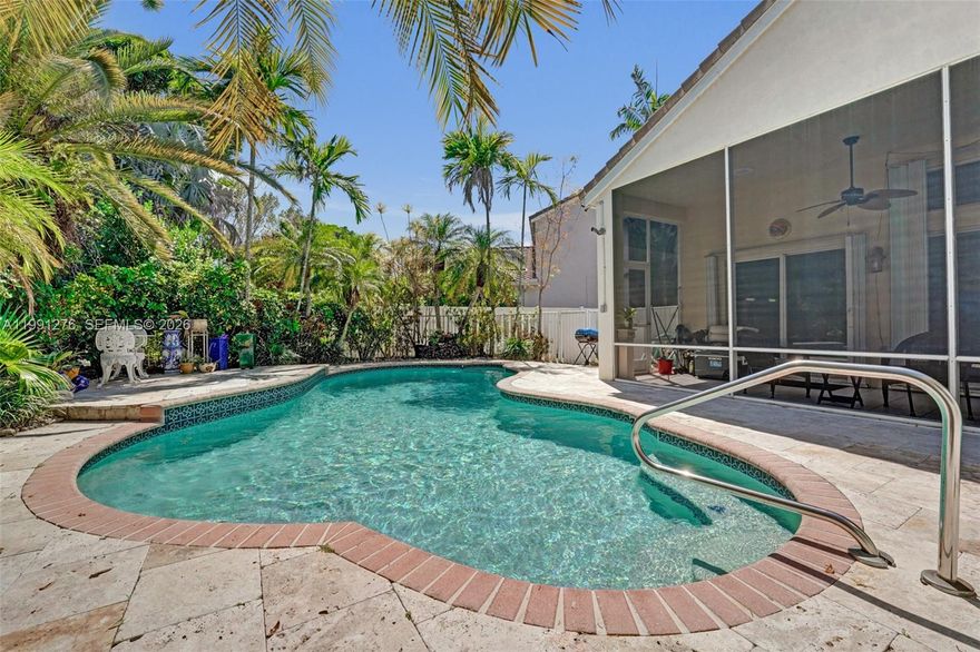 Welcome Home to this charming, single-story, 3-bedroom, 2-bathroom home nestled on a quiet cul-de-sac in The Falls, a highly desirable gated neighborhood. From the moment you arrive, you’ll appreciate the peaceful setting and inviting curb appeal. Step inside to a bright, open layout with tile flooring throughout. The kitchen and living areas flow seamlessly, creating an easy space for everyday living and entertaining.

The home opens naturally to your private outdoor retreat, featuring a beautifully landscaped pool area with travertine decking, perfect for relaxing or hosting gatherings.

A separate screened-in patio adds even more outdoor living space to enjoy year-round.

Additional highlights include accordion hurricane shutters for added peace of mind and convenience, along with the privacy and tranquility of cul-de-sac living.

Located in a gated community with great amenities and zoned for top-rated Weston schools, just minutes from shopping, dining, and major roadways.

This home offers the perfect blend of comfort, charm, and Florida lifestyle; don’t miss the opportunity to make it yours.