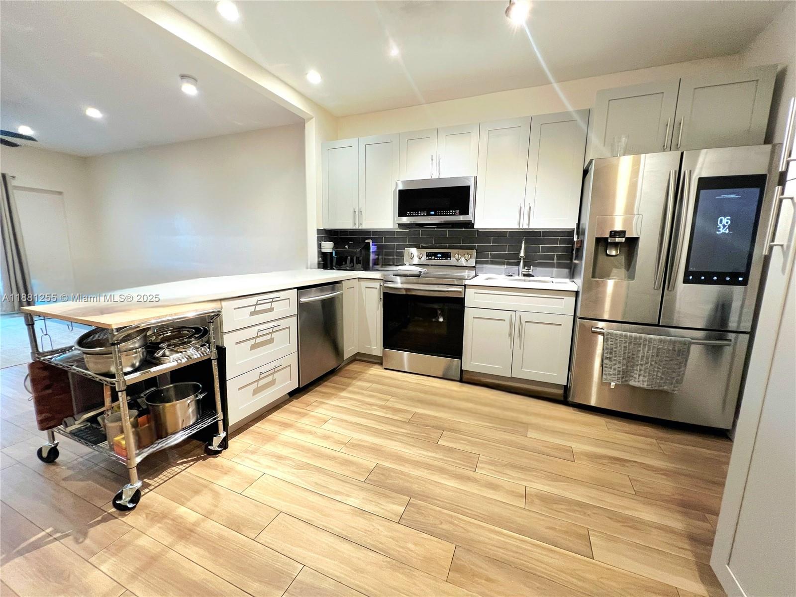 Beautiful, cozy, bright apartment on excellent and very convenient location. Off of 114th and Biscayne Blvd in North Miami. Walking distance to everything and transportation. Recently updated building common areas including balconies. Apartment also completely updated with open concept/layout. Spacious 2 bedrooms and nicely updated bathroom. Very well kept, impeccable, giving a fresh atmosphere for you to enjoy and call home. Modern light fixtures and open kitchen. Small boutique and quiet building. One assigned parking in secured/gated area. Gated and Fenced building with pool. Very quiet and safe dead-end street surrounded by exclusive condominiums. Five minutes to Bay Harbor, Bal Harbor and the beach. Brokers, read Brokers Remarks.
