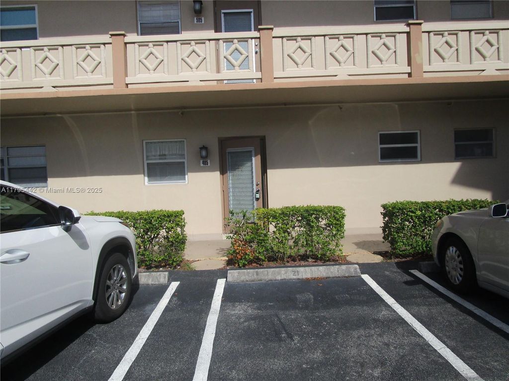Photo of 5003 NW 35 St #405, Lauderdale Lakes, FL 33319 (MLS # A11795442)