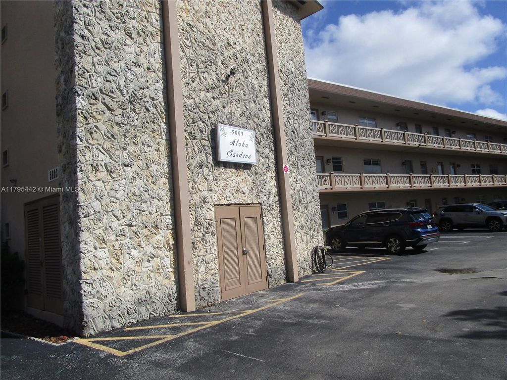 Photo of 5003 NW 35 St #405, Lauderdale Lakes, FL 33319 (MLS # A11795442)