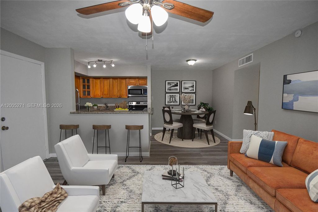 Photo of 9955 N Belfort Cir #112, Tamarac, FL 33321 (MLS # A12005271)