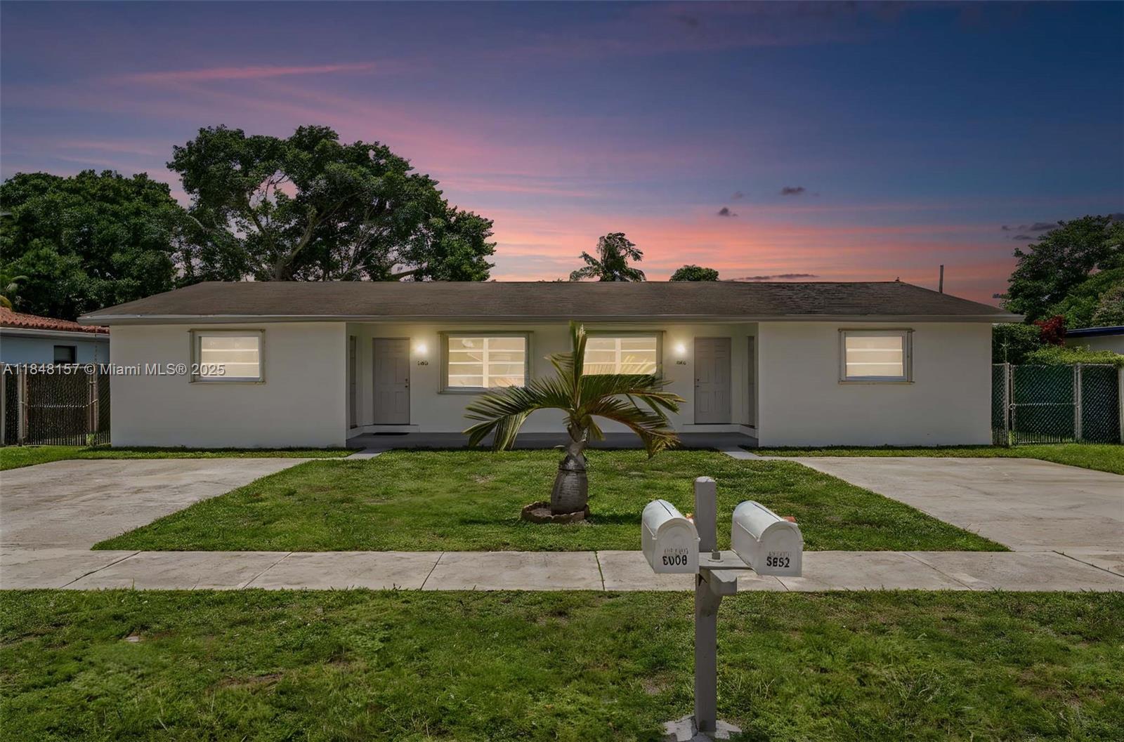 Beautifully maintained duplex with 2 bedrooms and 2 bathrooms on each side, each bedroom featuring its own private entrance—4 separate entrances in total per unit. Both units include private laundry rooms and are fully up to code and ready to rent. Features include 2 water meters, 3 electric meters, central A/C (2018), and roof (2007). One unit boasts a brand-new kitchen with onyx countertops and backsplash; the other has an updated kitchen. Hurricane shutters throughout, underground electrical, and freshly painted inside and out. Oversized 80x140 lot—ideal for investors or owner-occupants seeking strong rental income.