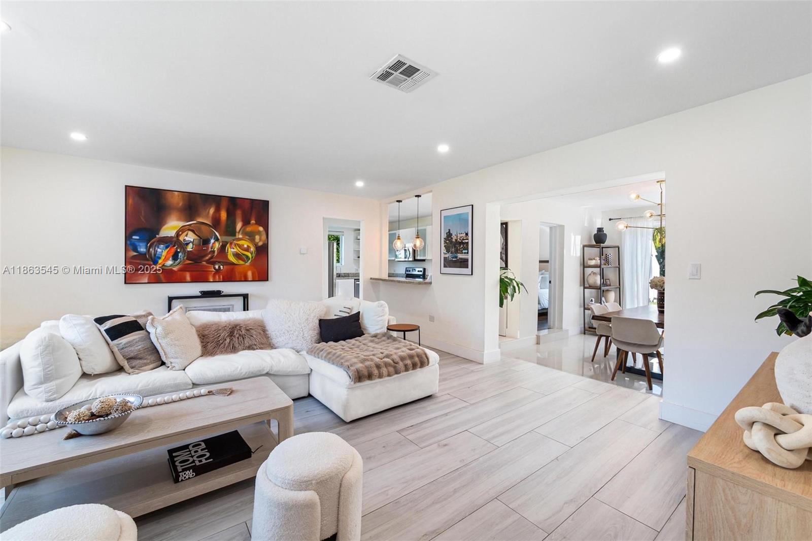 Luxurious and fully upgraded home in the heart of Miami’s Upper East Side, in a quiet and friendly neighborhood that has grown substantially in recent years. This minimalistic house features brand-new impact doors and windows, Italian wood-look tile flooring, and an open layout with sliding doors that lead to a long deck overlooking the nearly 10,000 sq. ft. backyard. Listed fully furnished, the third bedroom can be set as an office, with twin beds, or a queen bed. Recent renovations include a new A/C and plumbing system, upgraded water heater, hurricane-proof doors and windows, recessed lighting, and more.
Don’t miss the opportunity to live in paradise.
Pest control, landscaping, and ADT security included. Pets allowed.