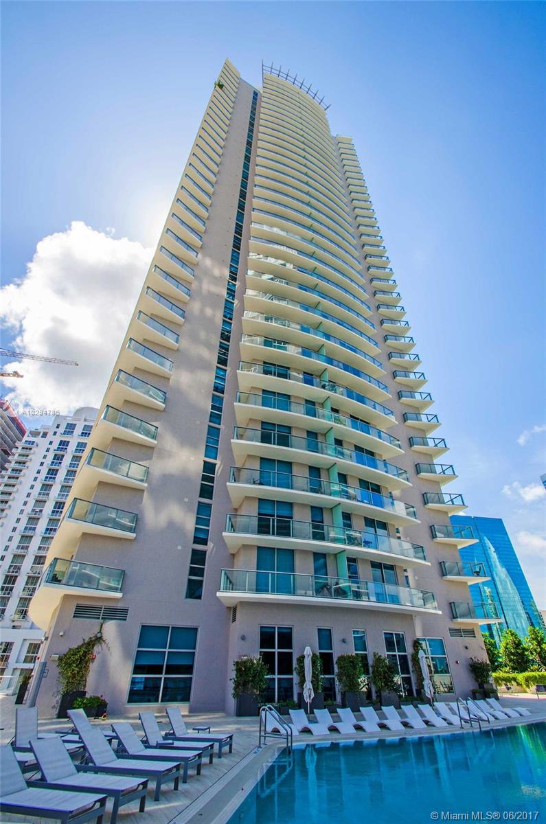 Brand new building in the heart of Brickell. Spectacular turn-key unit completely furnished. Spacious 2/2 + den condo with 2 car garage. Open kitchen, washer & dryer inside, big balcony. 24hours concierge & valet parking service, top of the line amenities include: Rooftop pool, fitness center, movie theater, kid's play room, Jacuzzi, social room. Easy to show!