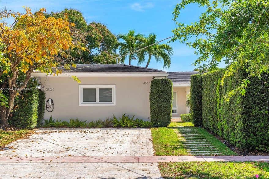 Welcome to this spacious 5-bed, 3-bath home in Miami Beach, where indoor and outdoor living spaces harmonize beautifully. Upon entry, you are welcomed by an expansive living area filled with natural light and modern finishes. The seamless integration of indoor and outdoor spaces includes a sizeable pool and generous yard with space for BBQ area. With beautifully maintained landscaping, including a privacy hedge, it is an ideal setting for entertaining. On a nearly 9,000 sf lot in the family-friendly Nautilus neighborhood, this property, inclusive of highly coveted garage, offers proximity to top-rated schools, the beach, 41st street shops, and Polo and Fisher parks. With easy access to downtown and the airport, this location is perfect for experiencing the best of Miami Beach living.