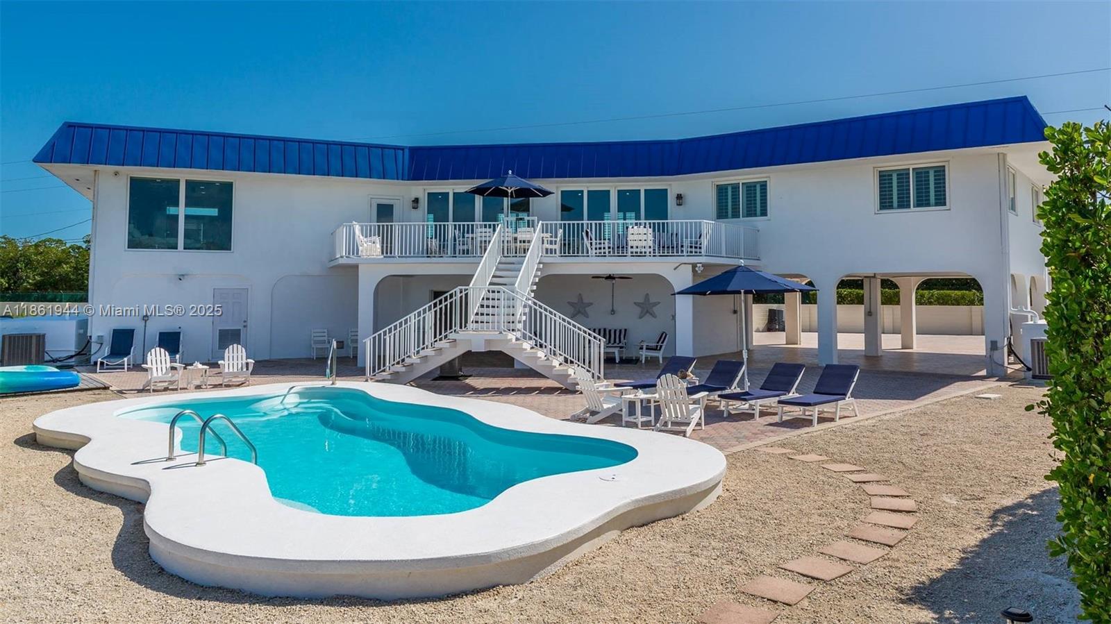 Welcome to Paradise!!!! Immerse yourself in Luxury!!!! This 5 Bedroom/3 Bathroom sleeps 12. Modern kitchen with open living room waterfront view floor plan. Huge Pool including Jacuzzi - Margarita machine, Barbecue, wine cooler, washer, dryer, dishwasher. Flat-screen TV with CABLE TV in all rooms with High-speed internet.
Jet Skiing - Boating -Fishing on the dock, a Basketball hoop, bean bag toss, ping pong table, 2 Paddleboards, 2 kayaks, 6 bicycles, 4 beach chairs, life jackets for kids. Book your Corporate stay or family vacation today.