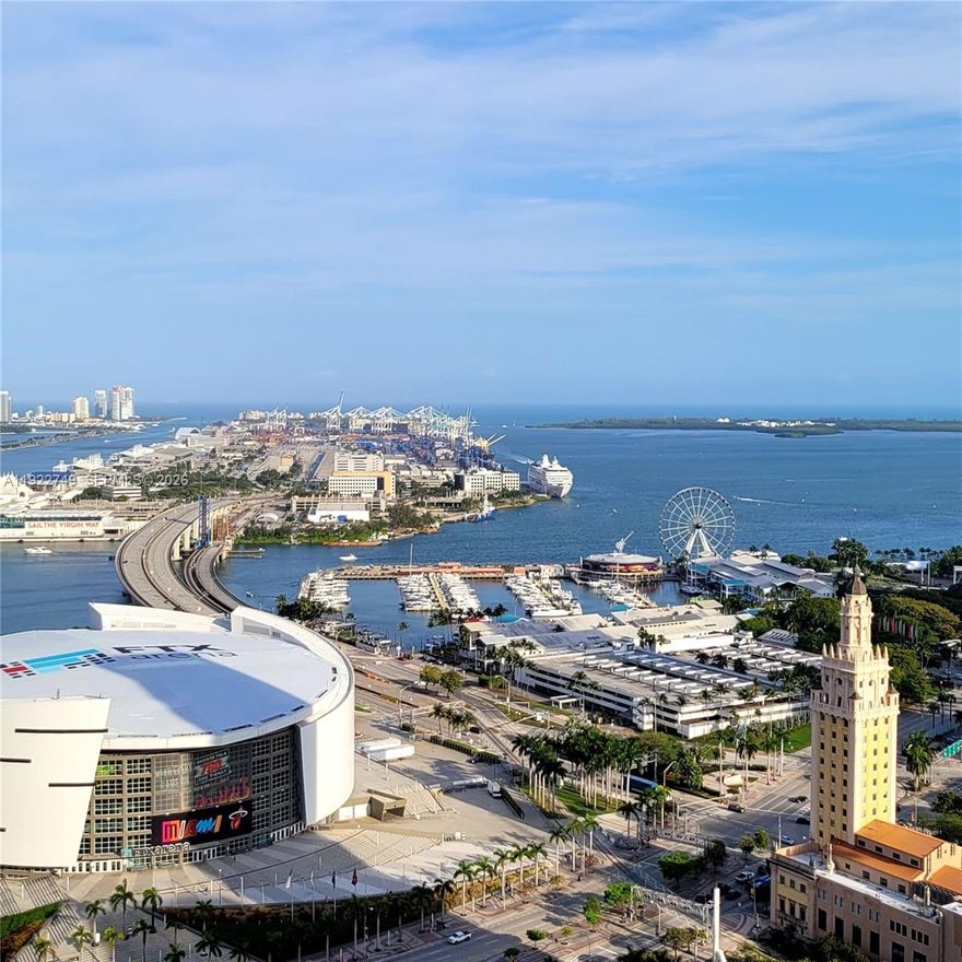 Experience elevated luxury living at Paramount Miami Worldcenter! This spectacular 2-bedroom, 3-bathroom plus Den on 33rd floor residence offers 10 ft floor-to-ceiling impact glass windows that flood the space with natural light and showcase breathtaking panoramic views of the Bay, Intracoastal, and Miami Skyline. A private elevator opens into your own foyer, leading to a spacious split-bedroom layout with a versatile Den. The European-style kitchen boasts custom cabinetry, a waterfall-edge island, and top-of-the-line Subzero/Bosch appliances. Both bedrooms feature custom built-out closets, while the primary suite includes a spa-inspired bath with dual vanities, soaking tub, and separate glass-enclosed shower. Enjoy resort-style amenities: 5 pools, spa, outdoor lounge, summer kitchen, state-of-the-art fitness center, boxing studio, yoga, racquetball, basketball court, observatory, jam room, recording studio, kids’ room, virtual golf, soccer field, sky deck, and rooftop pool, plus 24-hour front desk and valet. Situated in the vibrant Miami World Center, where you will find endless dining, shopping, and entertainment, 2nd largest master-planned community in the U.S., you’re just steps from the Brightline Station, Port of Miami, Kaseya Center, Bayside, and minutes to MIA Airport, Wynwood, Brickell, Midtown, Miami Beach and more. Can be rented up to 4 times per year, offering exceptional flexibility for end-users and investors alike.