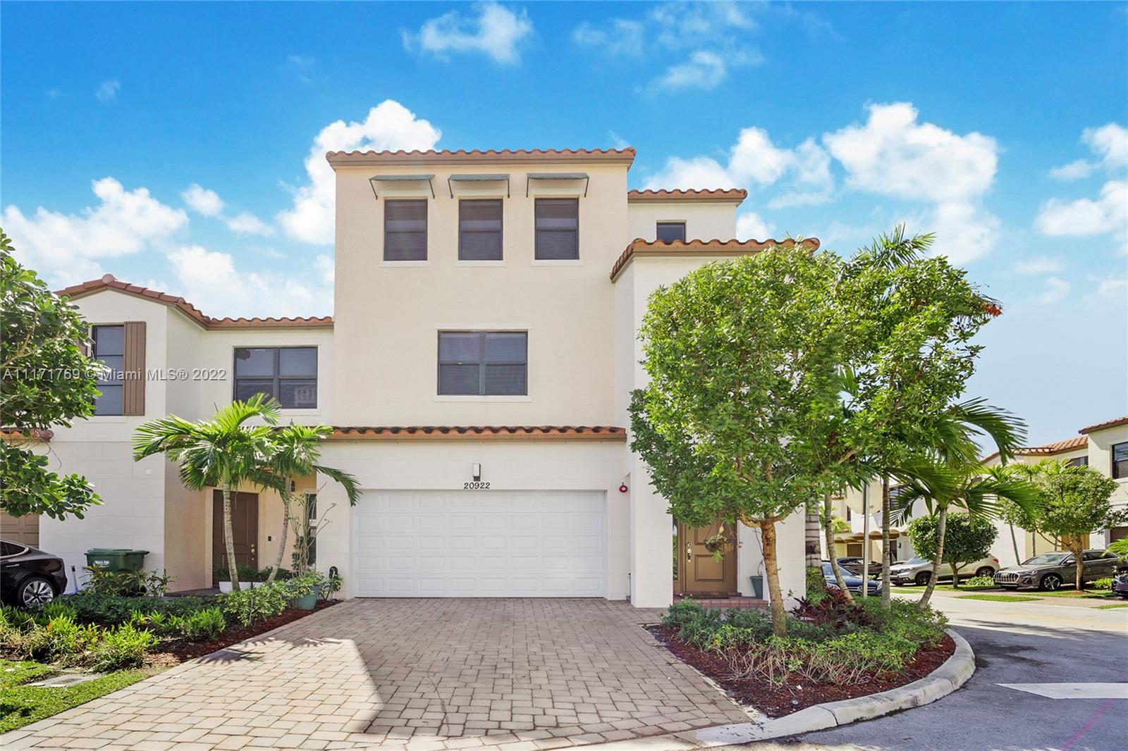 Modern townhouse with high ceilings and smart home features. Mimosa model is the largest in the community. An inviting covered entry leads to a covered private backyard & 2 car garage. The 1st floor is home to a 2nd master bedroom separate from the rest of the home,it's a perfect retreat for an office, in-laws or house guests. The 2nd floor boasts a great room, dining room, powder room, and modern kitchen with a walk-in pantry. The 3rd floor is devoted to personal space. Here you’ll discover your own primary suite and bathroom comfortably separated from your 2nd and 3rd bedrooms, full bath and full sized washer/dryer. upgraded interior finishes including porcelain wood flooring and premium kitchen finishes. 5 star amenities, lush landscape, and minutes from TOP schools and main highway.