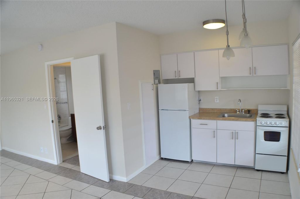 Photo of 1028 NE 16th Ter #1, Fort Lauderdale, FL 33304 (MLS # A11965321)