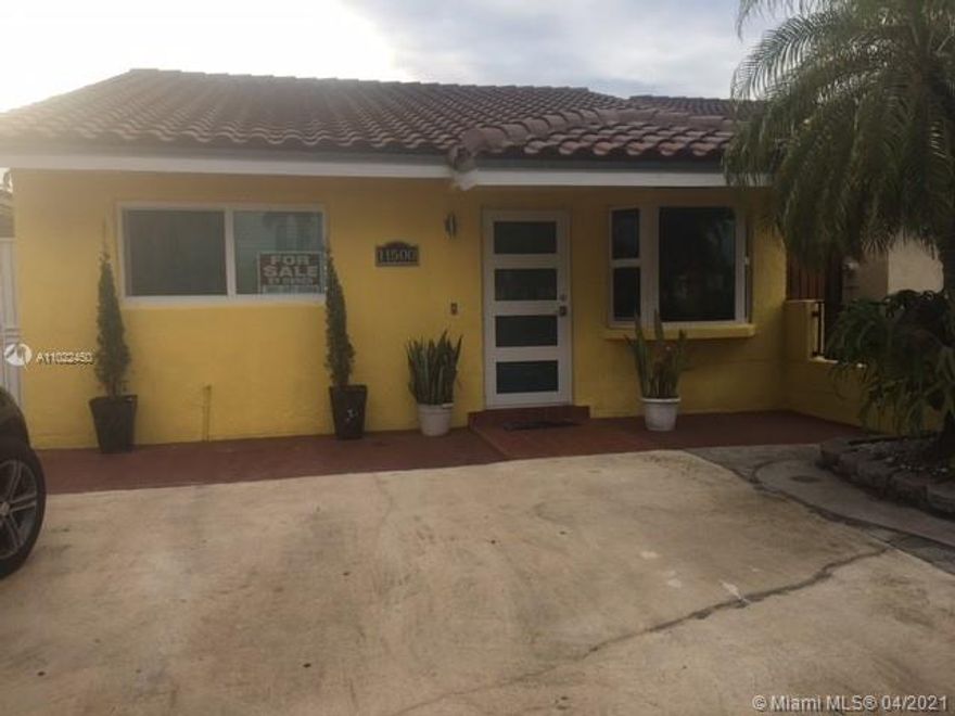 Home beautifully maintained3/2 with updated kitchen and bathroom.  Impact windows and roof was replaced in the past years.  Walk outside your home to beautiful palm trees and park area. Driveway can park approximately 6 cars.