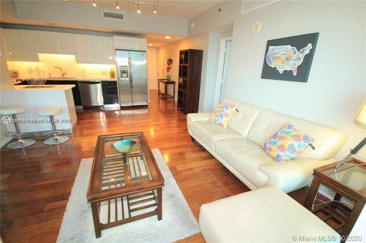 THE PLAZA 851 BRICKELL CO - Residential Lease