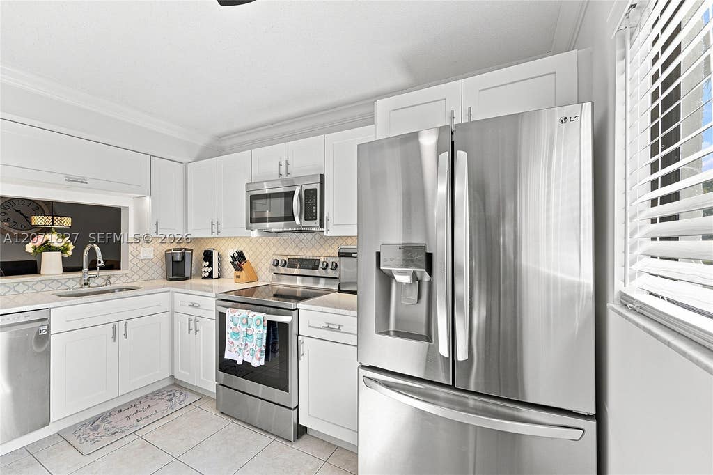 Photo of 15234 Lakes Of Delray Blvd #250, Delray Beach, FL 33484 (MLS # A12071827)