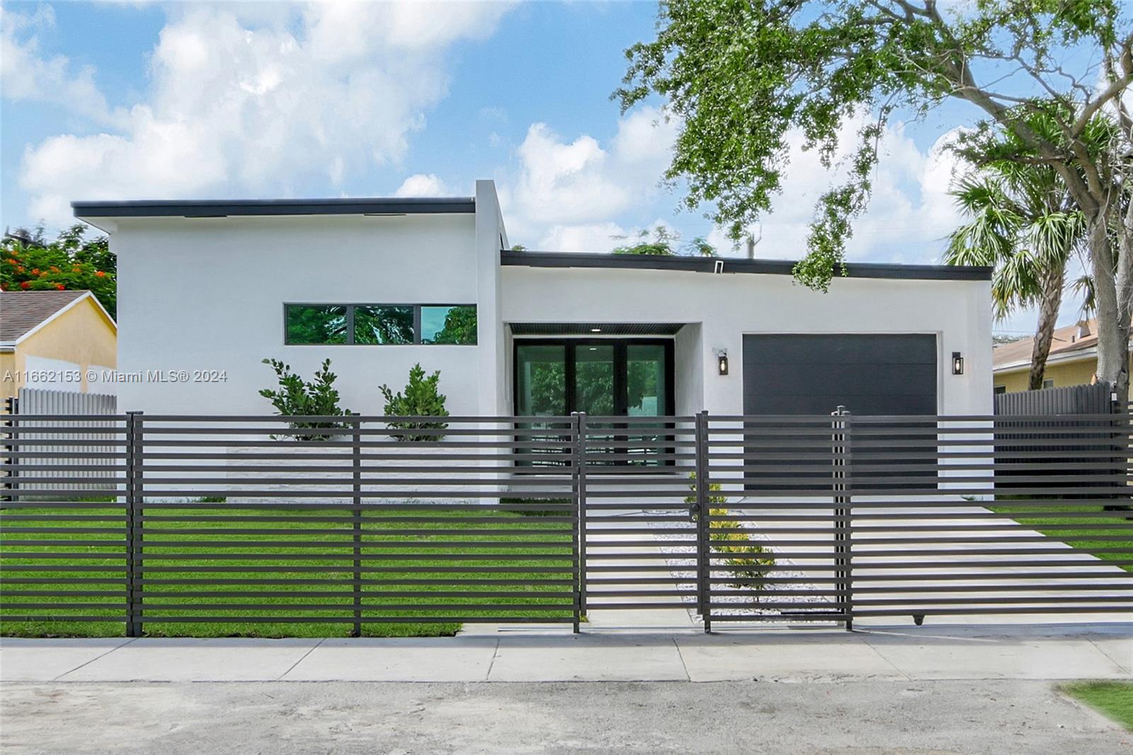 Stunning Brand new construction in the Heart of Miami's real estate. This house offers state of the art finishes and it's perfect for a big family to come and live in. All Bedrooms are king size bedrooms, and all 3 bathrooms are full bathrooms. The house features 11 ft high Ceilings, porcelain flooring,TONS of natural light, Limewash walls, Impact doors and windows and the kitchen is just amazing with an 8 foot long island and stainless steel appliances, the patio is partially covered and has a great outdoor kitchen.The house is located only 5 minutes from Buena vista and 6 minutes from Miami Design district. Only 2 months are due for move in, and no fees.