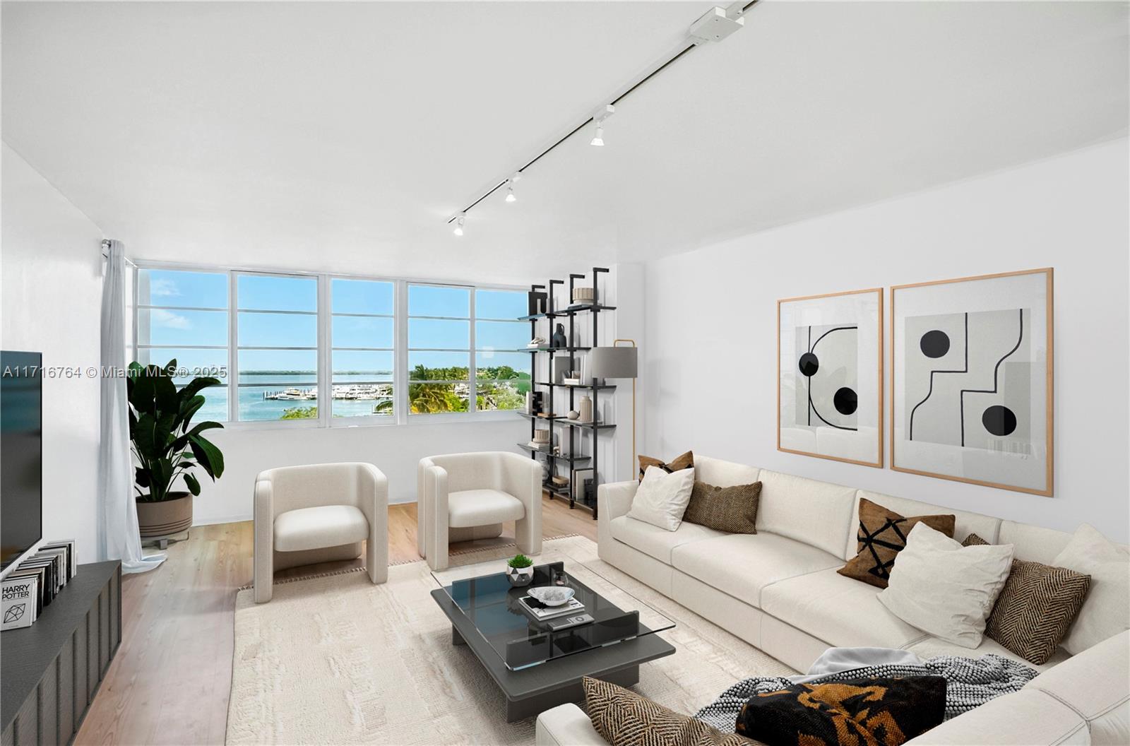 Miami Beach Gem with Income. Bright, updated 1-bed, 1-bath condo on a high floor with panoramic water views. Located just one block from Sunset Harbour, Two blocks from Lincoln Road, and steps to Trader Joe’s, Publix, and top restaurants. Features include an open European-style kitchen, stone countertops, hurricane-impact windows and doors, and a private balcony with sweeping bay views. Assigned parking included. Currently rented and generating income, ideal for investors or future homeowners. Nestled at the end of a quiet cul-de-sac near the Venetian Islands, this waterfront unit is in a 30-unit Mid-Century Modern boutique building. A rare find!