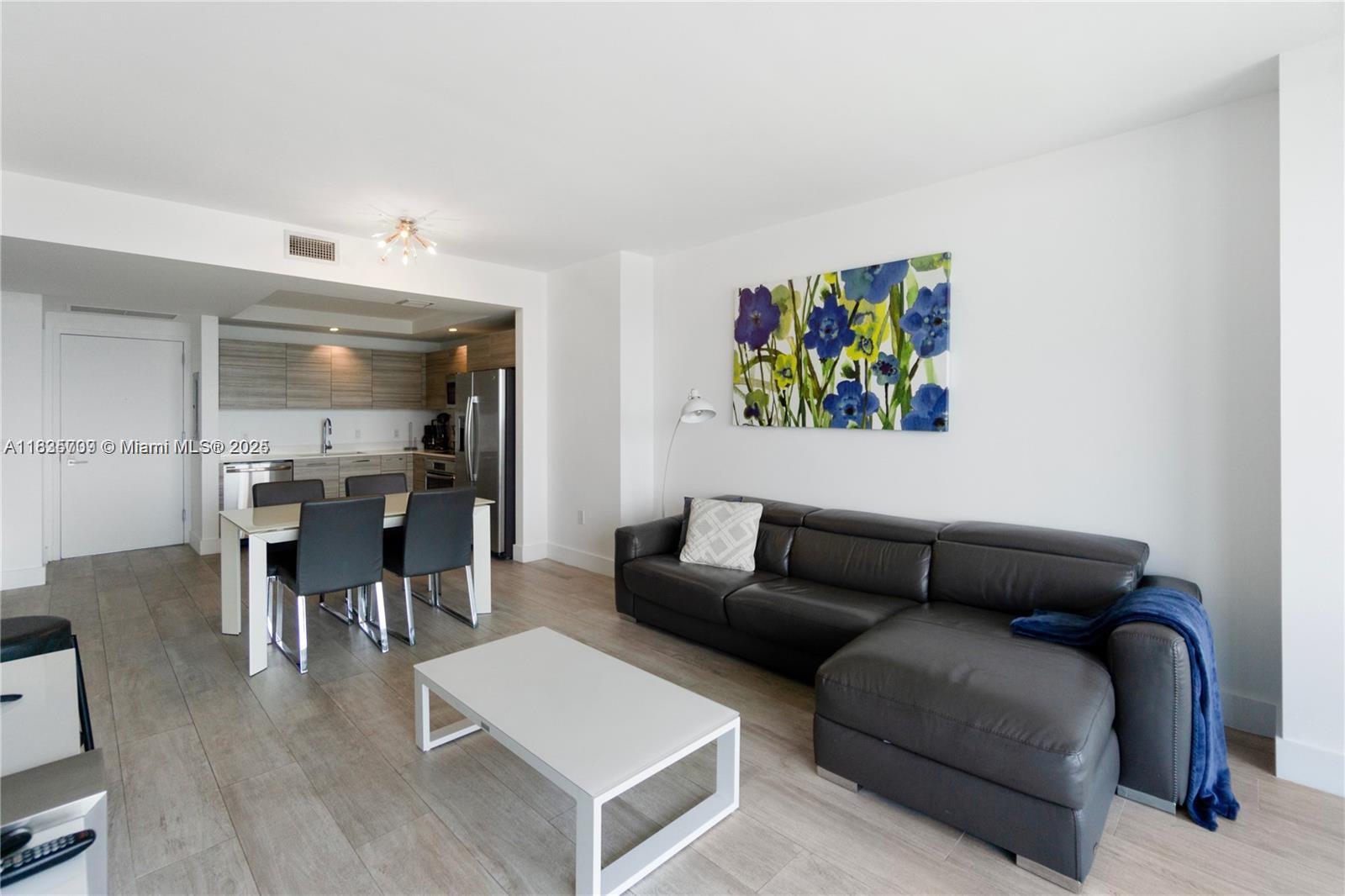 Amazing big size one bedroom plus den with gorgeous sunset view from 30th floor in Hyde Midtown. Tastefully furnished and decorated, it features blinds and sheers in both living room and bedroom, customized closet, shower/bathtub glass, pull-out sofa bed plus day bed in the den. Resort style building in the middle of Midtown Shops, the most desirable neighborhood in Miami. Rented until August 15, 2026 at $3700/mo, AAA tenant. Showings possible on Thursdays and Fridays after 2pm, Pls allow 24h notice for showings.