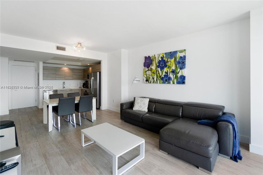 Amazing big size one bedroom plus den with gorgeous sunset view from 30th floor in Hyde Midtown. Tastefully furnished and decorated, it features blinds and sheers in both living room and bedroom, customized closet, shower/bathtub glass, pull-out sofa bed plus day bed in the den. Resort style building in the middle of Midtown Shops, the most desirable neighborhood in Miami. Rented until August 15, 2026 at $3700/mo, AAA tenant. Showings possible on Thursdays and Fridays after 2pm, Pls allow 24h notice for showings.