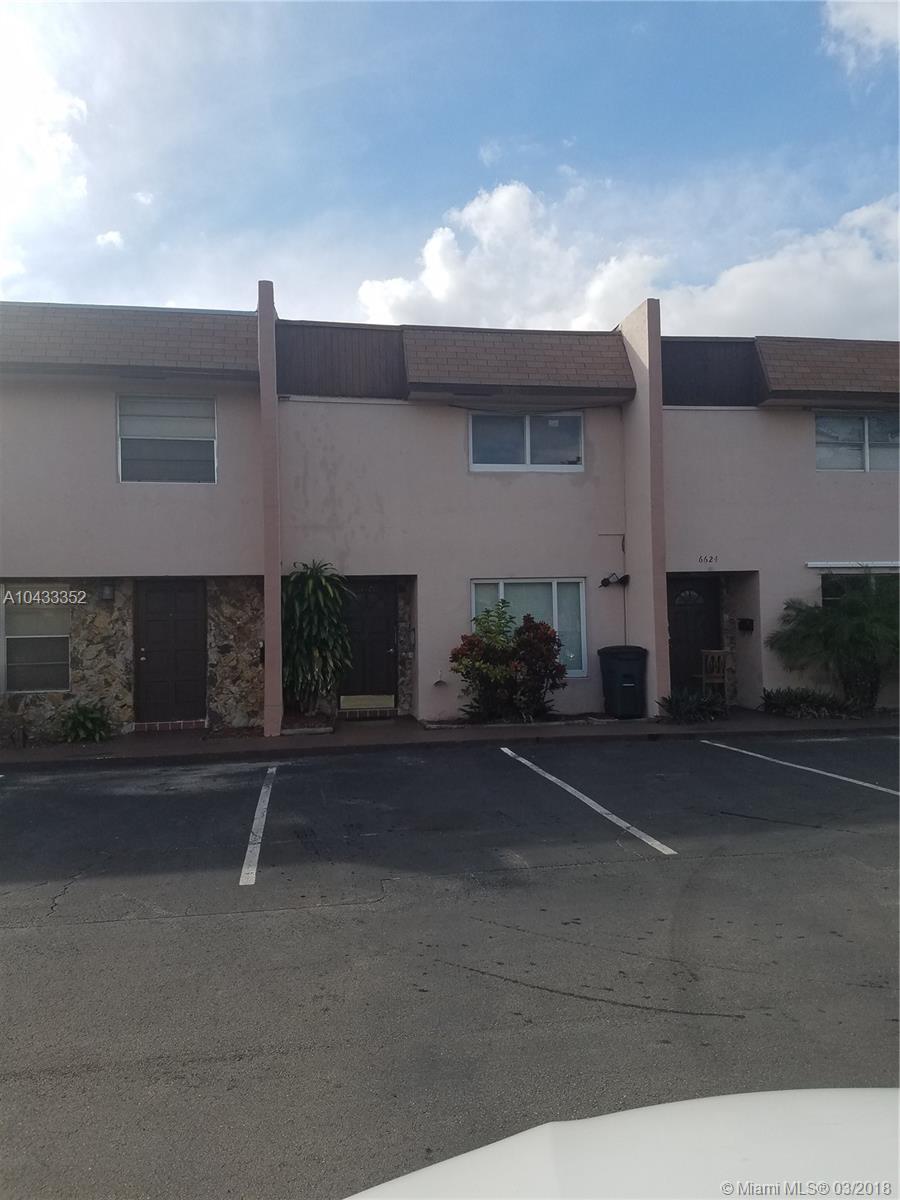 Spacious townhome near Nova university, tile and wood floor with remodeled kitchen impact windows and doors private backyard. vacant easy to show