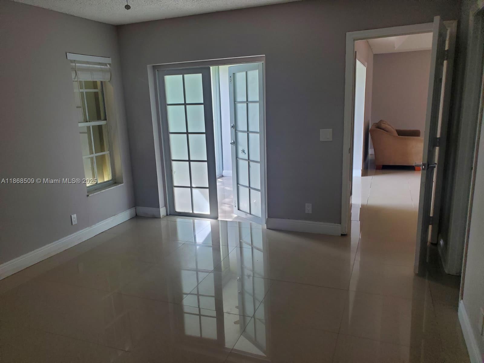 Lakefront single-family home in a quiet neighborhood. Freshly repainted with 3 bedrooms (including a converted patio that can serve as a bedroom or office) and 2 baths. Community offers 2 clubhouses, pool, and close access to shopping and schools.
