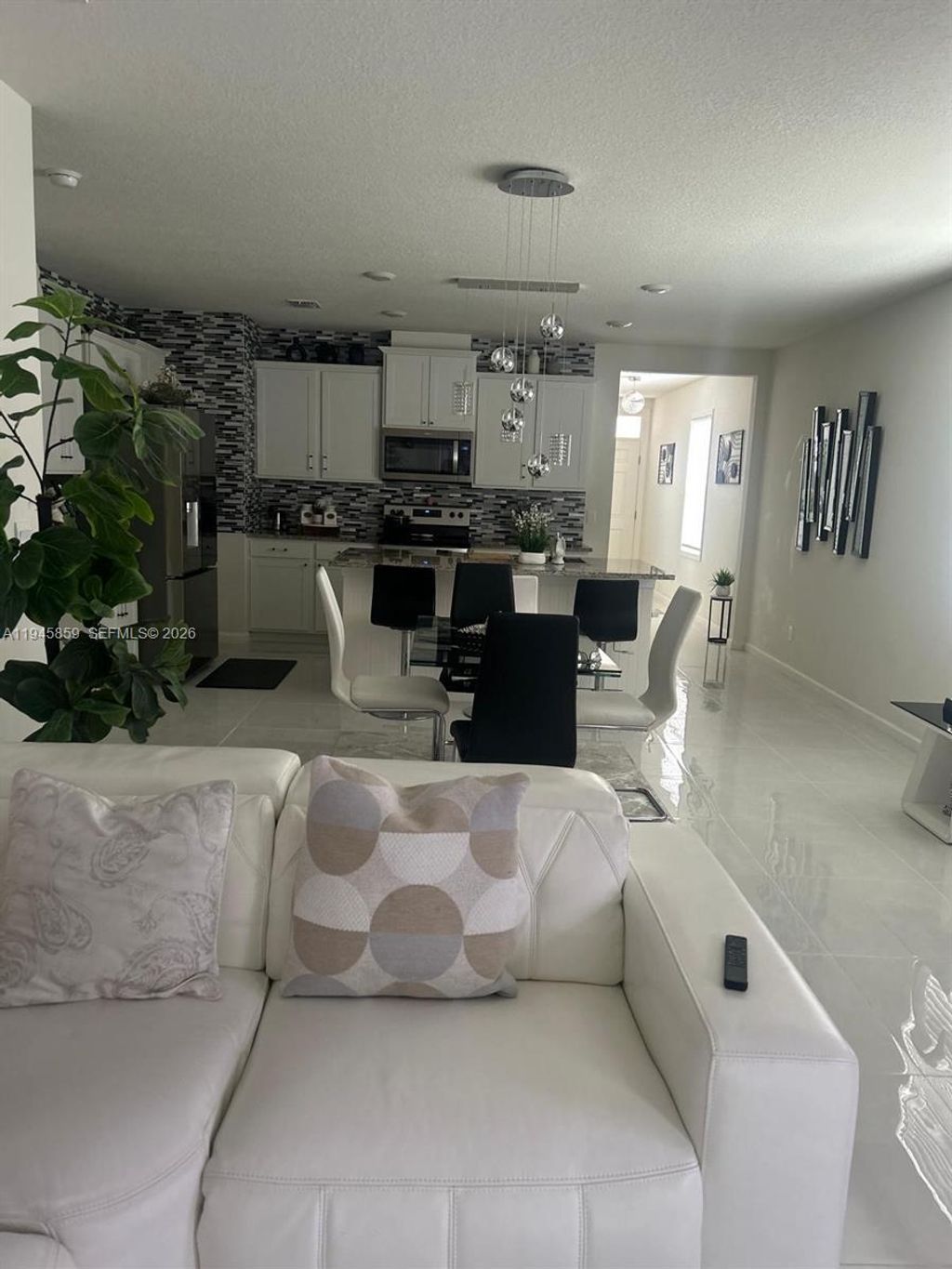 Photo of 12422 SW Rimini Way, Port St Lucie, FL 34987 (MLS # A11945859)