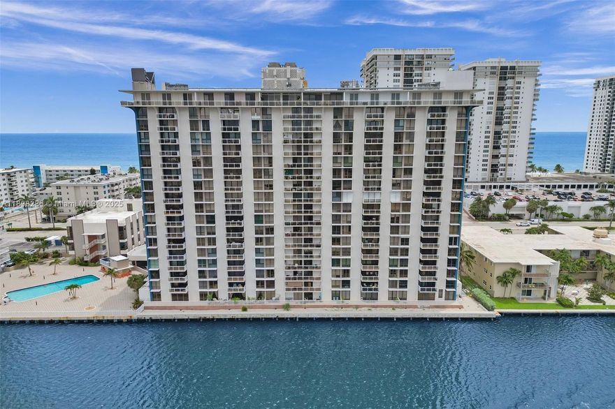 Beautiful fully-furnished condo features 1 bedroom, 1.5 bathrooms, and captivating panoramic views of the scenic intracoastal, overlooking the opulent water-front mansions of Harbor Island. Enjoy the daily scenic sunsets from the comfort of your covered balcony. The master-suite includes a walk-in closet, sitting area, and laminate-wood floors. One permanent assigned parking space included. Centrally located within walking distance to Hollywood's finest dining, shopping, entertainment, and beaches. Assigned ground level parking space included.