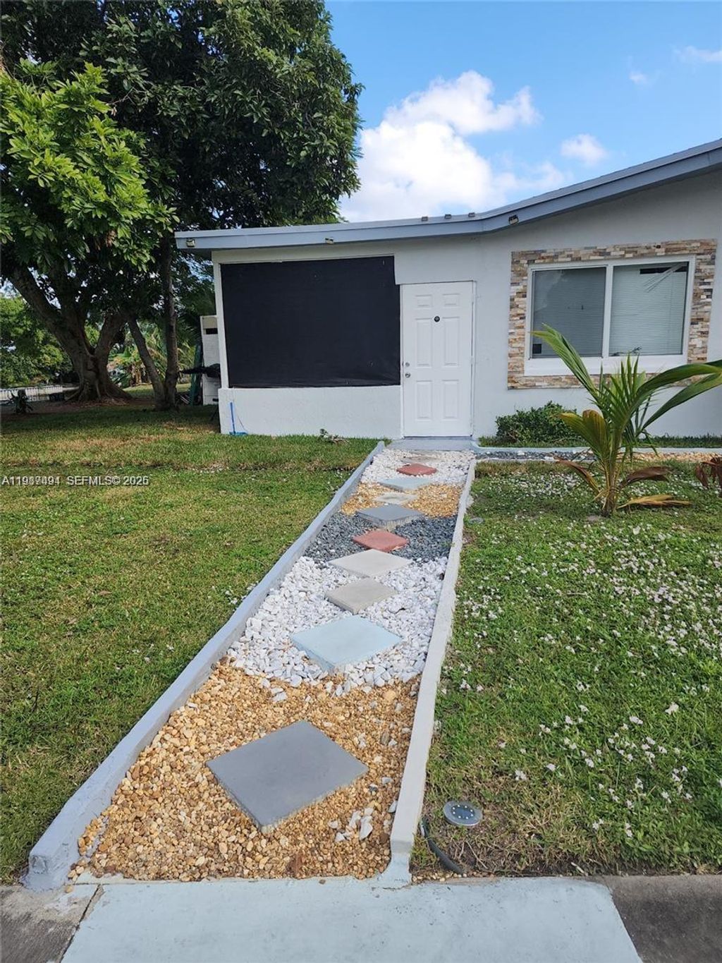 Photo of 4795 NW 42nd St #C, Lauderdale Lakes, FL 33319 (MLS # A11987494)