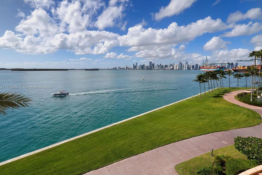 Fully renovated 3 bedroom, 4.5 bath masterpiece has a modern open floor plan with stunning views of the Miami skyline and Biscayne Bay. This pristine 3rd floor unit has clean lines in a modern Italian style, with marble and wood floors throughout, Venetian stucco and hand plastered walls, recessed lighting & ceilings, and top of the line kitchen w/ Gaggenau and Subzero appliances. Master suite boasts a stunning bathroom and abundant walk-in closet with Magic City views. Two en-suite guest bedrooms share a terrace overlooking golf course and Government Cut. This entertainer's dream comes with a full service onyx bar, complete with Sub-Zero wine fridge, ice maker, mini-fridge and beer tap. Couple this condo with the 5-star Fisher Island amenities and this is truly the best of island living.