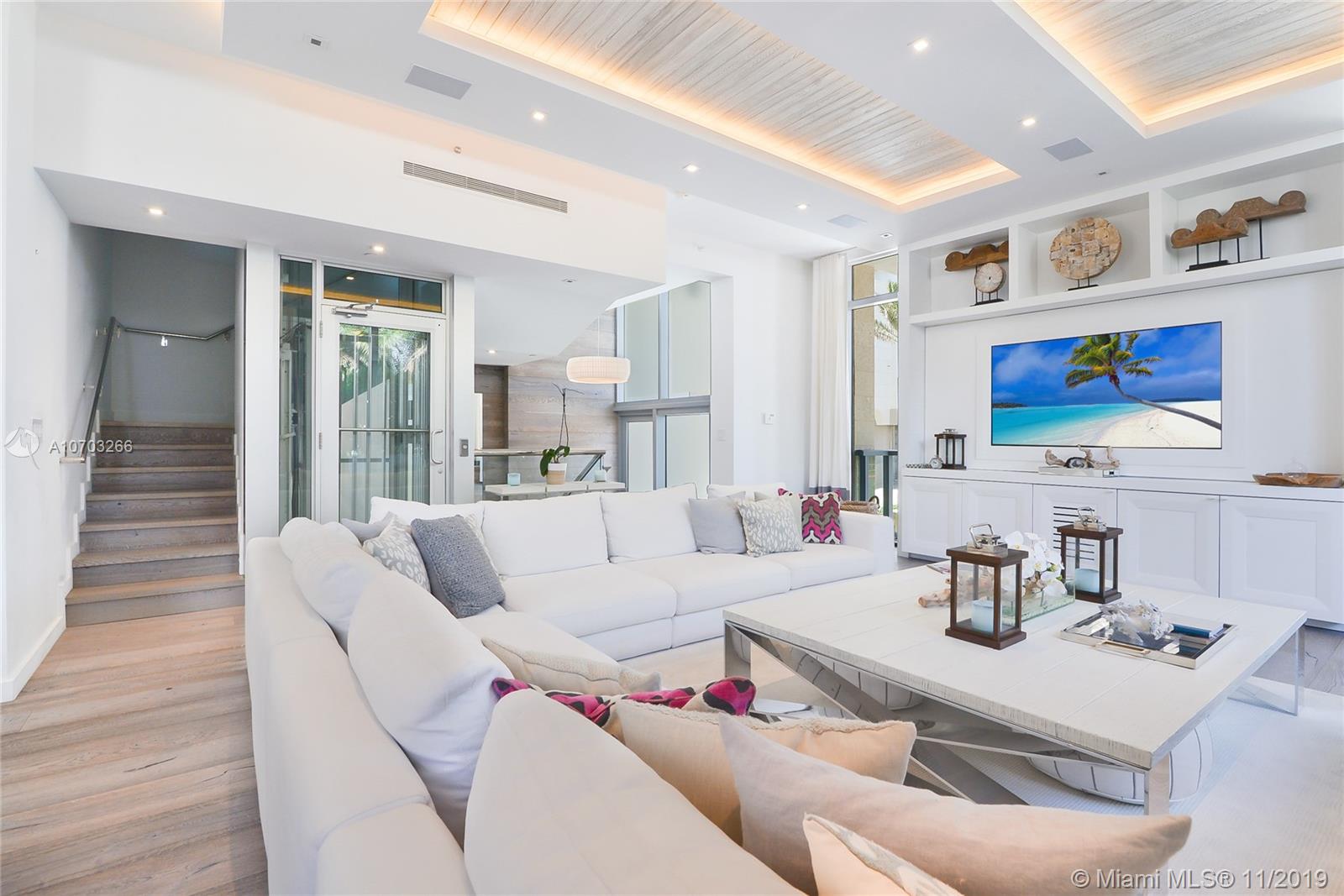 Truly rare to find, an exceptional beachfront townhome steps from the pristine BalHarbour shoreline. A modern masterpiece, this residence showcases thoughtful design details and luxury features throughout. Enjoy a private rooftop terrace with summer kitchen, plunge pool with city and ocean views, beach service, 2car garage, guest quarters with private entrance. Sleek chef&#x2019;s kitchen equipped with Wolfe, Bosch and SubZero appliances, 14&#x2019; recessed ceilings with custom lighting, wide-plank oak flooring and full-height windows. All three levels are connected by a glass elevator, the floor-through master suite includes his and hers walk-in closets and spa bathroom. Spacious bedrooms with ensuite baths and terraces. No rental restrictions! Super location, across from Bal Harbour Shops.