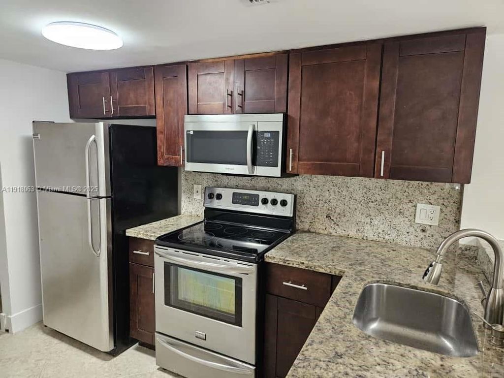 Photo of 10725 Cleary Blvd #206, Plantation, FL 33324 (MLS # A11918063)