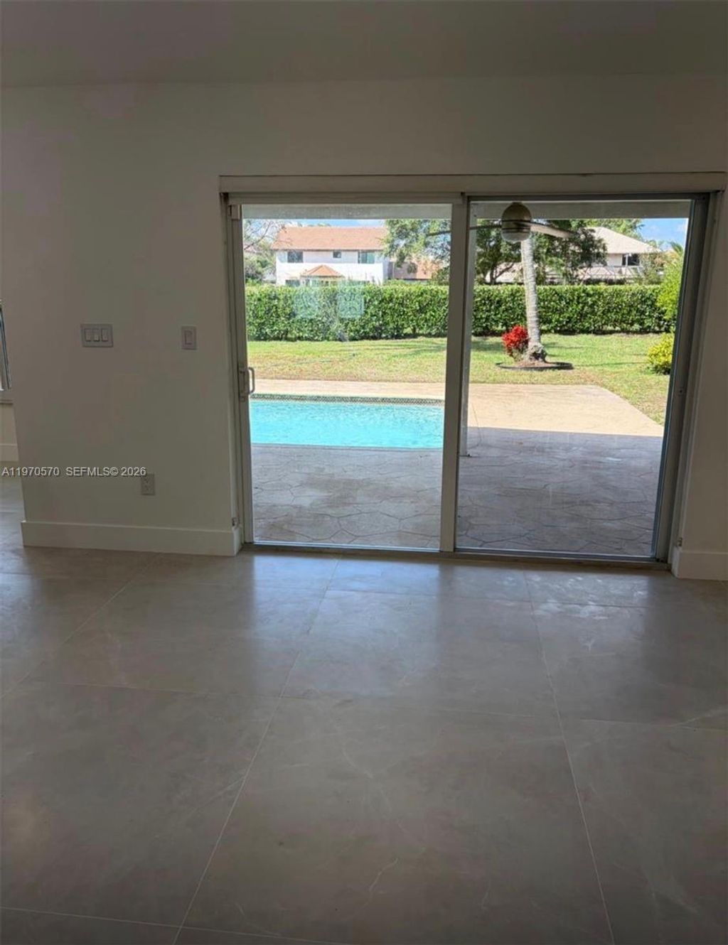 Photo of 801 Amherst Ave, Davie, FL 33325 (MLS # A11970570)