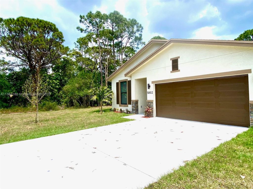 Photo of 5802 Killarney Ave, Fort Pierce, FL 34951 (MLS # A11367188)