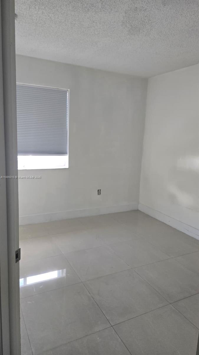 VILLA DORAL CONDO NO 5 - Residential Lease