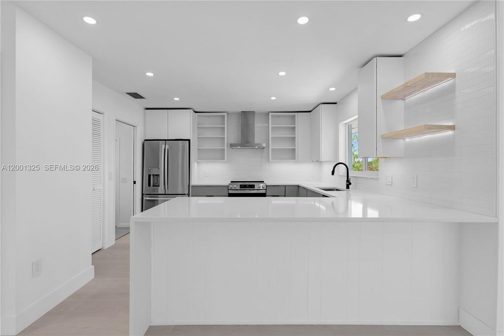 Photo of 9125 SE Karin St, Hobe Sound, FL 33455 (MLS # A12001325)